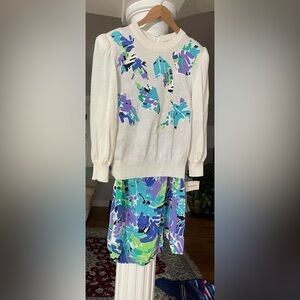Plat LTD women’s two piece sweater & skirt. Top is white with Detail, size 12